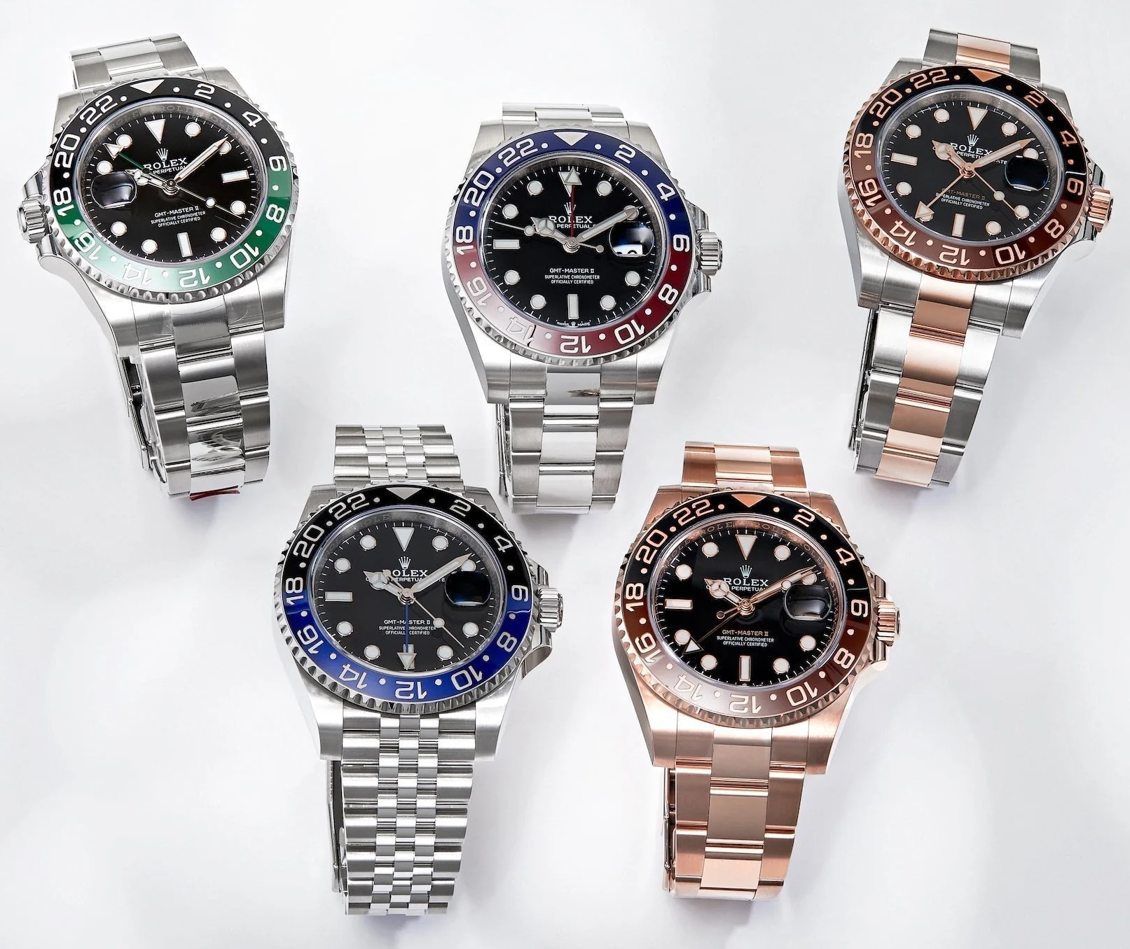 Коллекция конфигураций Rolex GMT-Master II: Batman (сине-чёрный), Pepsi (красно-синий), Rootbeer (коричнево-чёрный), Bruce Wayne (чёрно-серый), зелёный Cerachrom и модели из жёлтого и розового золота